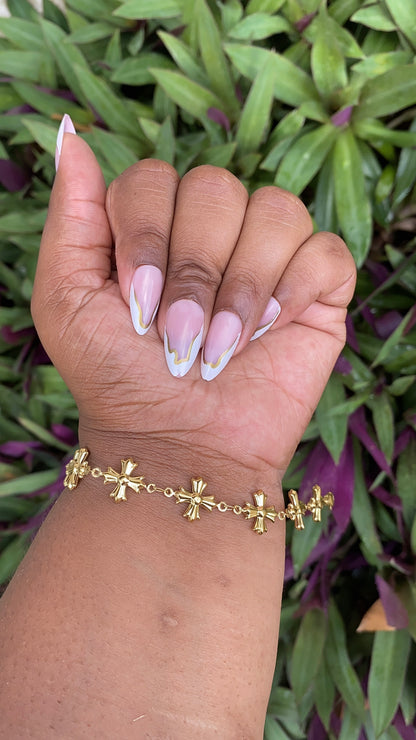 Crossed In Gold