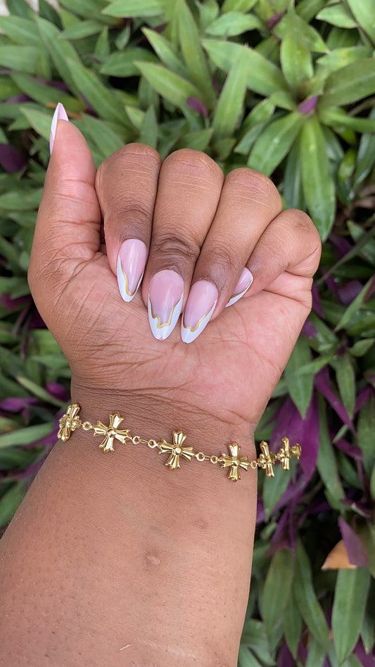 Crossed In Gold